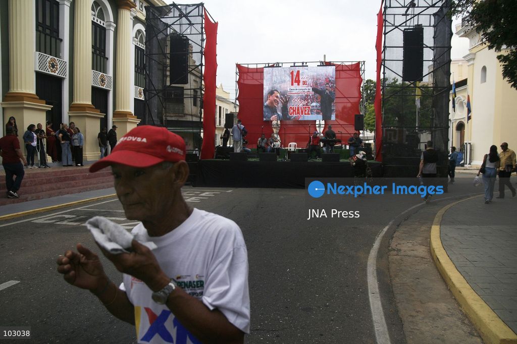 MARACAIBO, VENEZUELA, OCTOBER 7, 2026: Government supporters and state security personnel gather in central Maracaibo during an event marking the 14th anniversary of Hugo Chavez's 2012 presidential election victory. Zulia Governor Luis Caldera attended the commemoration as government supporters marched through the city. The event took place amid heightened political tensions and continuing public complaints over prolonged electricity outages in Zulia. Opposition activists from Vente Venezuela alleged that government resources and security deployments were used to obstruct a separate protest over electricity rationing, a claim that could not be independently verified. Photo by Humberto Matheus / JNA PRESS (Photo by Humberto Matheus/JNA Press via Nexpher Images)