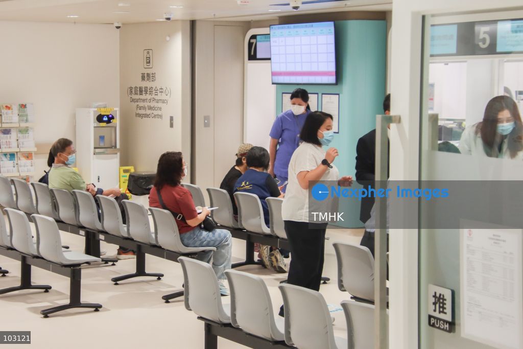 Patients wait to collect prescribed medication at the pharmacy of the Family Medicine Integrated Centre at Kai Tak Hospital in Hong Kong on October 5, 2026, the first day of the hospital's phased opening. (Photo by Gordon Choi/TMHK via Nexpher Images)
