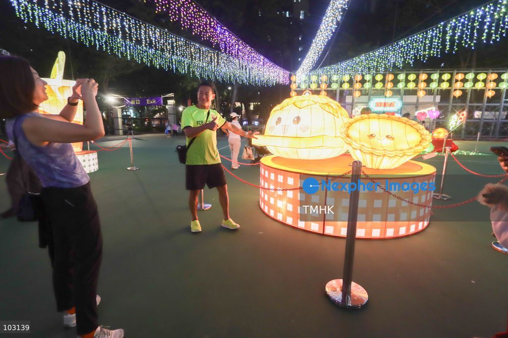 A general view of the Mid-Autumn Lantern Carnival at Victoria Park in Hong Kong on October 7, 2026. Visitors admire and photograph colourful lantern displays on the final day of the exhibition, which was extended following a positive public response. (Photo by Gordon Choi/TMHK via Nexpher Images)