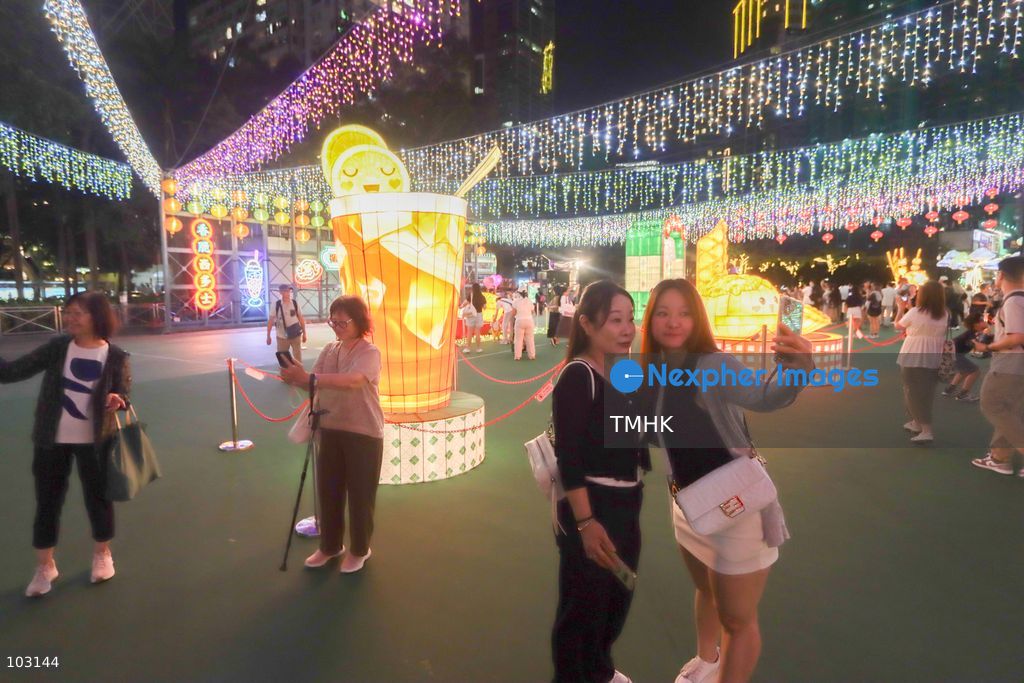 A general view of the Mid-Autumn Lantern Carnival at Victoria Park in Hong Kong on October 7, 2026. Visitors admire and photograph colourful lantern displays on the final day of the exhibition, which was extended following a positive public response. (Photo by Gordon Choi/TMHK via Nexpher Images)