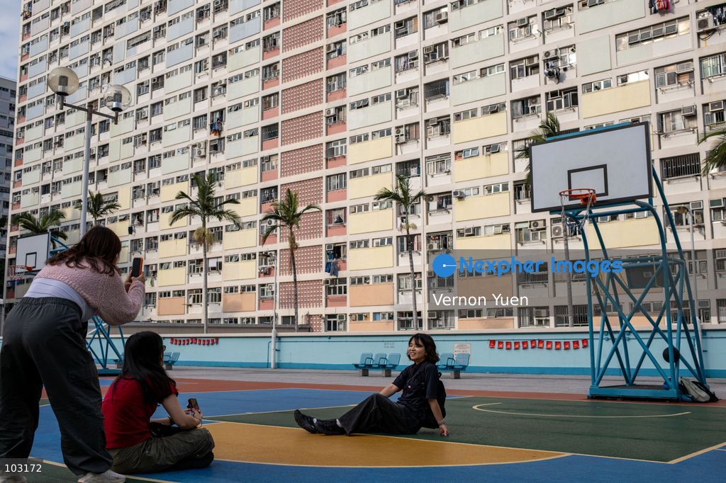A girl posing for a photo on a playground at Choi Hung Estate on October 8, 2026 in Hong Kong. (Photo by Vernon Yuen/Nexpher Images)