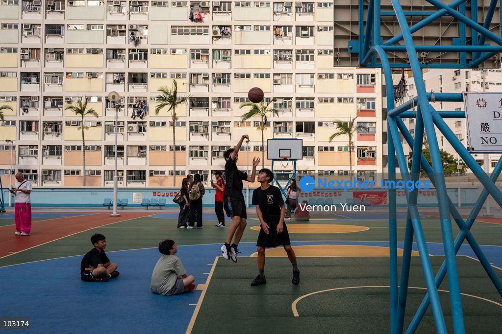 A boy scoring a basketball at Choi Hung Estate on October 8, 2026 in Hong Kong. (Photo by Vernon Yuen/Nexpher Images)