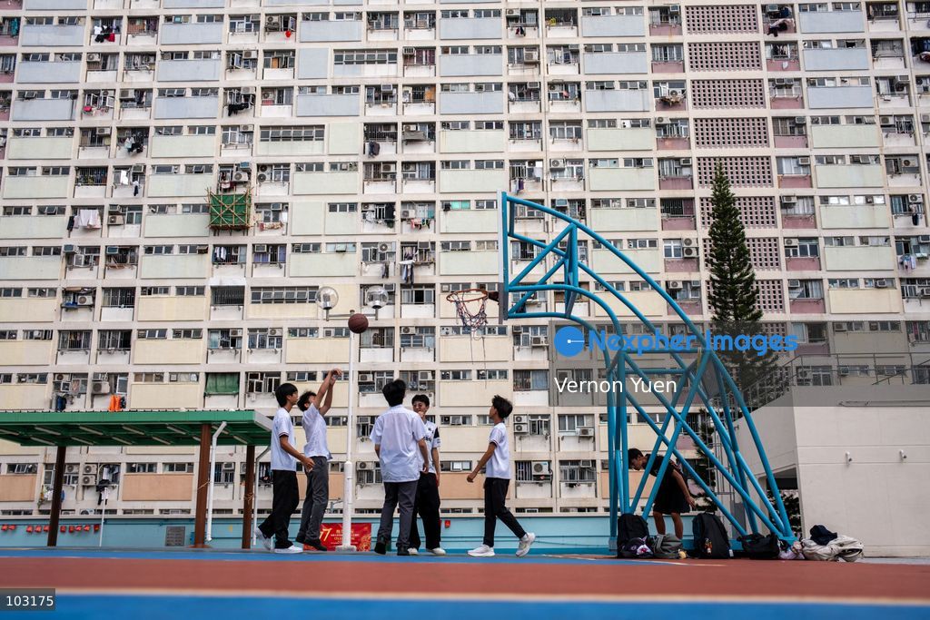 Students playing basketball at a basketball court at Choi Hung Estate on October 8, 2026 in Hong Kong. (Photo by Vernon Yuen/Nexpher Images)