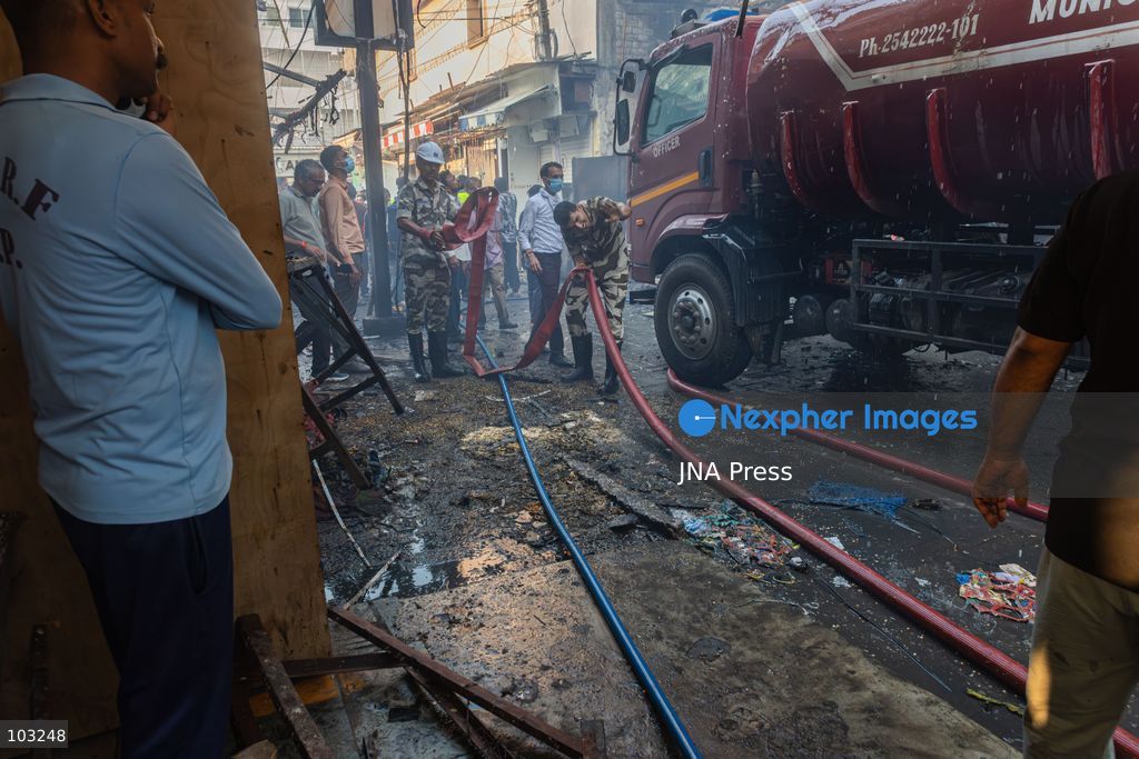 BHOPAL, MADHYA PRADESH, INDIA, OCTOBER 8, 2026: Firefighters battle a major fire at the New Market commercial area in Bhopal on Thursday afternoon. The blaze reportedly started at a fast-food outlet before spreading to several nearby shops, including clothing, kitchenware and mobile phone stores. More than 15 fire engines were deployed to contain the flames as thick smoke rose above the crowded shopping district. Photo by Sauvik Acharyya / JNA Press. (Photo by Sauvik Acharyya/JNA Press via Nexpher Images)