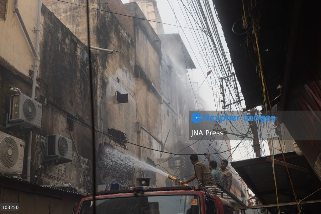 BHOPAL, MADHYA PRADESH, INDIA, OCTOBER 8, 2026: Firefighters battle a major fire at the New Market commercial area in Bhopal on Thursday afternoon. The blaze reportedly started at a fast-food outlet before spreading to several nearby shops, including clothing, kitchenware and mobile phone stores. More than 15 fire engines were deployed to contain the flames as thick smoke rose above the crowded shopping district. Photo by Sauvik Acharyya / JNA Press. (Photo by Sauvik Acharyya/JNA Press via Nexpher Images)