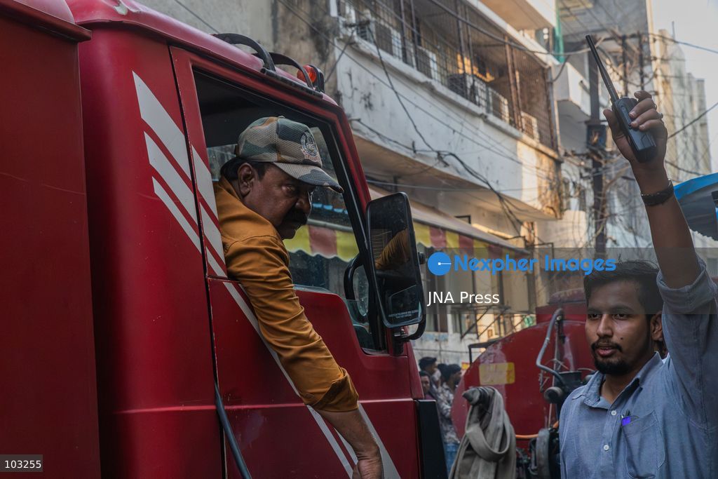 BHOPAL, MADHYA PRADESH, INDIA, OCTOBER 8, 2026: Firefighters battle a major fire at the New Market commercial area in Bhopal on Thursday afternoon. The blaze reportedly started at a fast-food outlet before spreading to several nearby shops, including clothing, kitchenware and mobile phone stores. More than 15 fire engines were deployed to contain the flames as thick smoke rose above the crowded shopping district. Photo by Sauvik Acharyya / JNA Press. (Photo by Sauvik Acharyya/JNA Press via Nexpher Images)