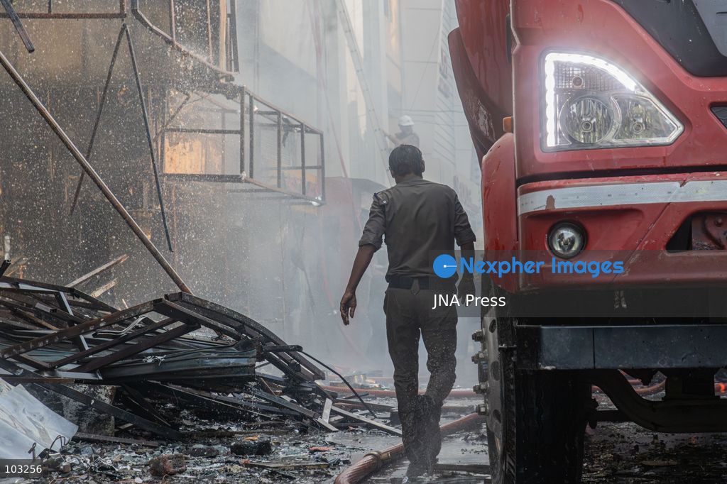 BHOPAL, MADHYA PRADESH, INDIA, OCTOBER 8, 2026: Firefighters battle a major fire at the New Market commercial area in Bhopal on Thursday afternoon. The blaze reportedly started at a fast-food outlet before spreading to several nearby shops, including clothing, kitchenware and mobile phone stores. More than 15 fire engines were deployed to contain the flames as thick smoke rose above the crowded shopping district. Photo by Sauvik Acharyya / JNA Press. (Photo by Sauvik Acharyya/JNA Press via Nexpher Images)