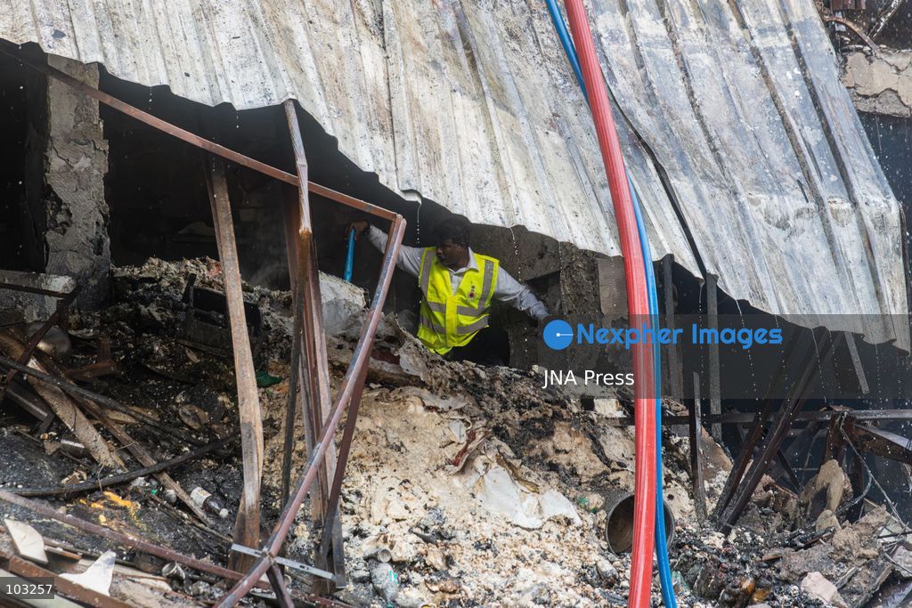 BHOPAL, MADHYA PRADESH, INDIA, OCTOBER 8, 2026: Firefighters battle a major fire at the New Market commercial area in Bhopal on Thursday afternoon. The blaze reportedly started at a fast-food outlet before spreading to several nearby shops, including clothing, kitchenware and mobile phone stores. More than 15 fire engines were deployed to contain the flames as thick smoke rose above the crowded shopping district. Photo by Sauvik Acharyya / JNA Press. (Photo by Sauvik Acharyya/JNA Press via Nexpher Images)
