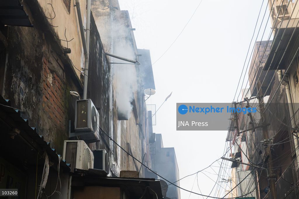 BHOPAL, MADHYA PRADESH, INDIA, OCTOBER 8, 2026: Firefighters battle a major fire at the New Market commercial area in Bhopal on Thursday afternoon. The blaze reportedly started at a fast-food outlet before spreading to several nearby shops, including clothing, kitchenware and mobile phone stores. More than 15 fire engines were deployed to contain the flames as thick smoke rose above the crowded shopping district. Photo by Sauvik Acharyya / JNA Press. (Photo by Sauvik Acharyya/JNA Press via Nexpher Images)