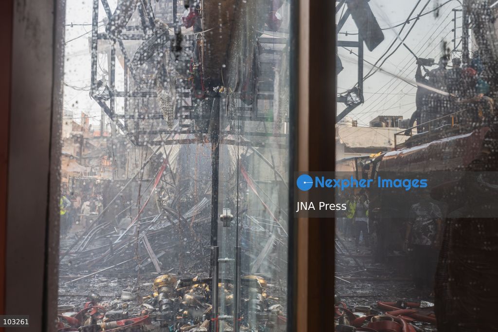 BHOPAL, MADHYA PRADESH, INDIA, OCTOBER 8, 2026: Firefighters battle a major fire at the New Market commercial area in Bhopal on Thursday afternoon. The blaze reportedly started at a fast-food outlet before spreading to several nearby shops, including clothing, kitchenware and mobile phone stores. More than 15 fire engines were deployed to contain the flames as thick smoke rose above the crowded shopping district. Photo by Sauvik Acharyya / JNA Press. (Photo by Sauvik Acharyya/JNA Press via Nexpher Images)