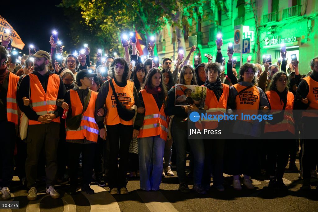 MADRID, SPAIN, OCTOBER 8, 2026: Thousands of people march through central Madrid in memory of Maricarmen Abascal, an 87-year-old woman who died on October 7, two weeks after being evicted from the apartment where she had lived for 71 years. Organized by the Sindicato de Inquilinas de Madrid, the march began at Puerta del Sol and ended outside Abascal's former home in the Retiro district. Around 20,000 people participated, according to the Spanish government's delegation in Madrid. Abascal's eviction on September 23 sparked widespread housing protests and encampments across Spain, with demonstrators demanding stronger tenant protections and measures against evictions. Photo by Tomas Calle / JNA Press. (Photo by Tomas Calle/JNA Press via Nexpher Images)