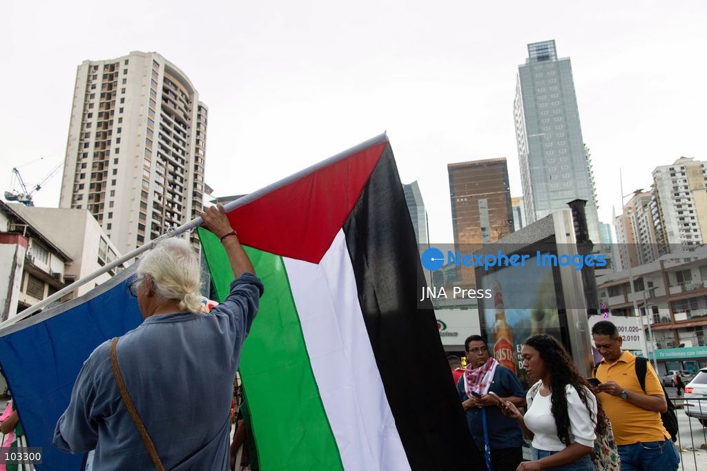 PANAMA CITY, PANAMA, OCTOBER 8, 2026: Pro-Palestinian demonstrators march through central Panama City despite heavy rain, carrying Palestinian flags and banners and chanting in solidarity with Palestinians in Gaza. Participants denounced Israel's military campaign in Gaza and called for an end to the war as they marched through the city center. Photo by Andres Trujillo / JNA Press. (Photo by AndrÃ©s Trujillo/JNA Press via Nexpher Images)