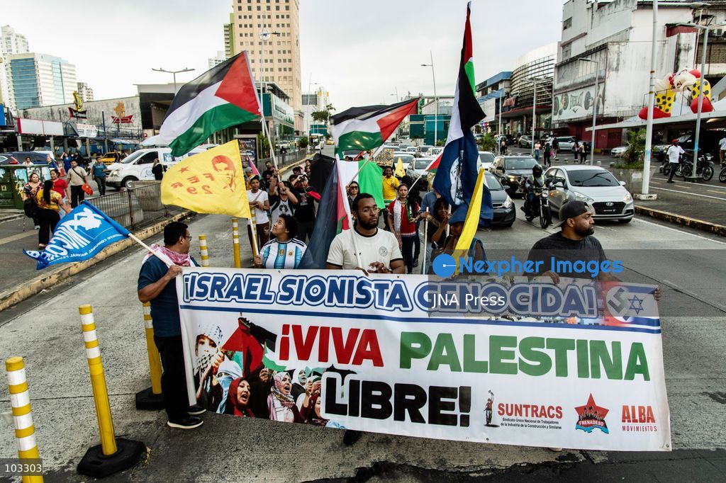 PANAMA CITY, PANAMA, OCTOBER 8, 2026: Pro-Palestinian demonstrators march through central Panama City despite heavy rain, carrying Palestinian flags and banners and chanting in solidarity with Palestinians in Gaza. Participants denounced Israel's military campaign in Gaza and called for an end to the war as they marched through the city center. Photo by Andres Trujillo / JNA Press. (Photo by Andrés Trujillo/JNA Press via Nexpher Images)