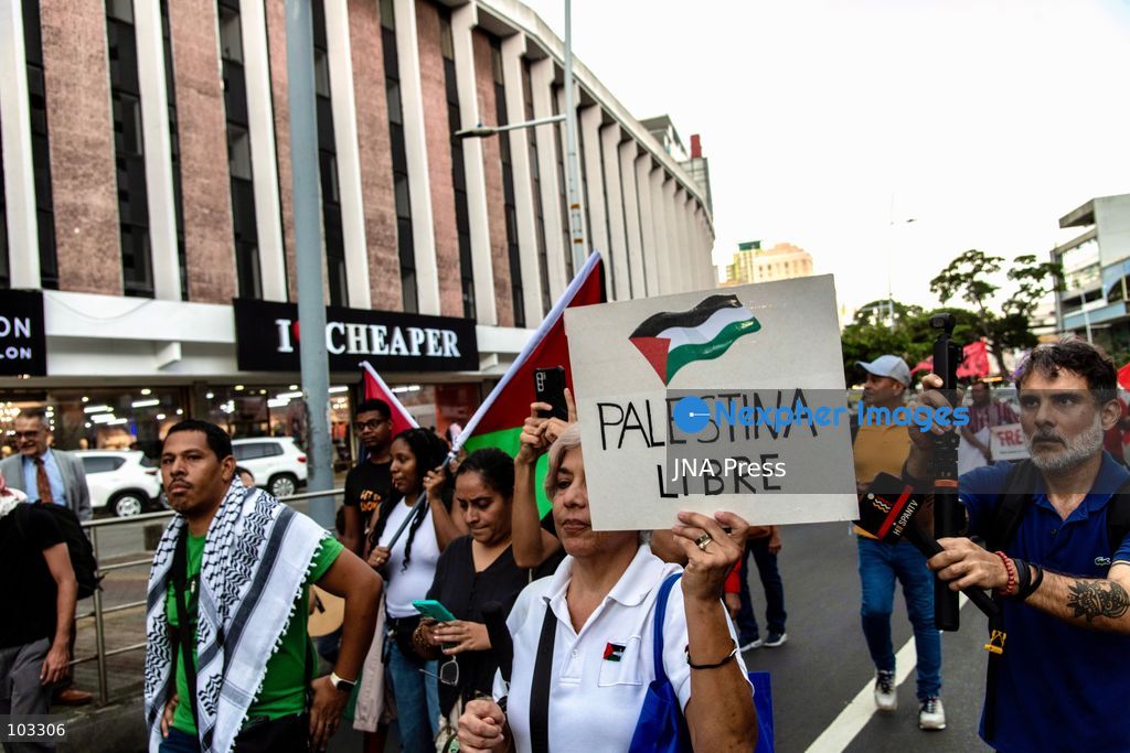 PANAMA CITY, PANAMA, OCTOBER 8, 2026: Pro-Palestinian demonstrators march through central Panama City despite heavy rain, carrying Palestinian flags and banners and chanting in solidarity with Palestinians in Gaza. Participants denounced Israel's military campaign in Gaza and called for an end to the war as they marched through the city center. Photo by Andres Trujillo / JNA Press. (Photo by Andrés Trujillo/JNA Press via Nexpher Images)