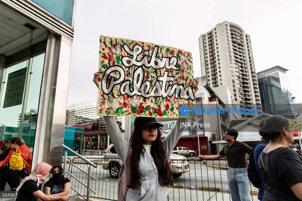 PANAMA CITY, PANAMA, OCTOBER 8, 2026: Pro-Palestinian demonstrators march through central Panama City despite heavy rain, carrying Palestinian flags and banners and chanting in solidarity with Palestinians in Gaza. Participants denounced Israel's military campaign in Gaza and called for an end to the war as they marched through the city center. Photo by Andres Trujillo / JNA Press. (Photo by Andrés Trujillo/JNA Press via Nexpher Images)