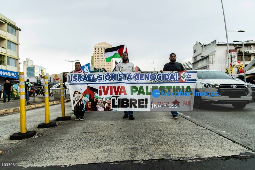 PANAMA CITY, PANAMA, OCTOBER 8, 2026: Pro-Palestinian demonstrators march through central Panama City despite heavy rain, carrying Palestinian flags and banners and chanting in solidarity with Palestinians in Gaza. Participants denounced Israel's military campaign in Gaza and called for an end to the war as they marched through the city center. Photo by Andres Trujillo / JNA Press. (Photo by Andrés Trujillo/JNA Press via Nexpher Images)