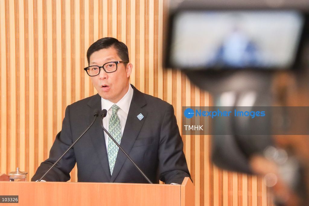 Hong Kong Secretary for Security Chris Tang Ping-keung addresses the media as a television news camera films his remarks at the Central Government Offices in Hong Kong on October 9, 2026. Tang says the government is fully prepared for the opening of the new Huanggang Port, which will provide 24-hour passenger clearance services from October 12. (Photo by Gordon Choi/TMHK via Nexpher Images)
