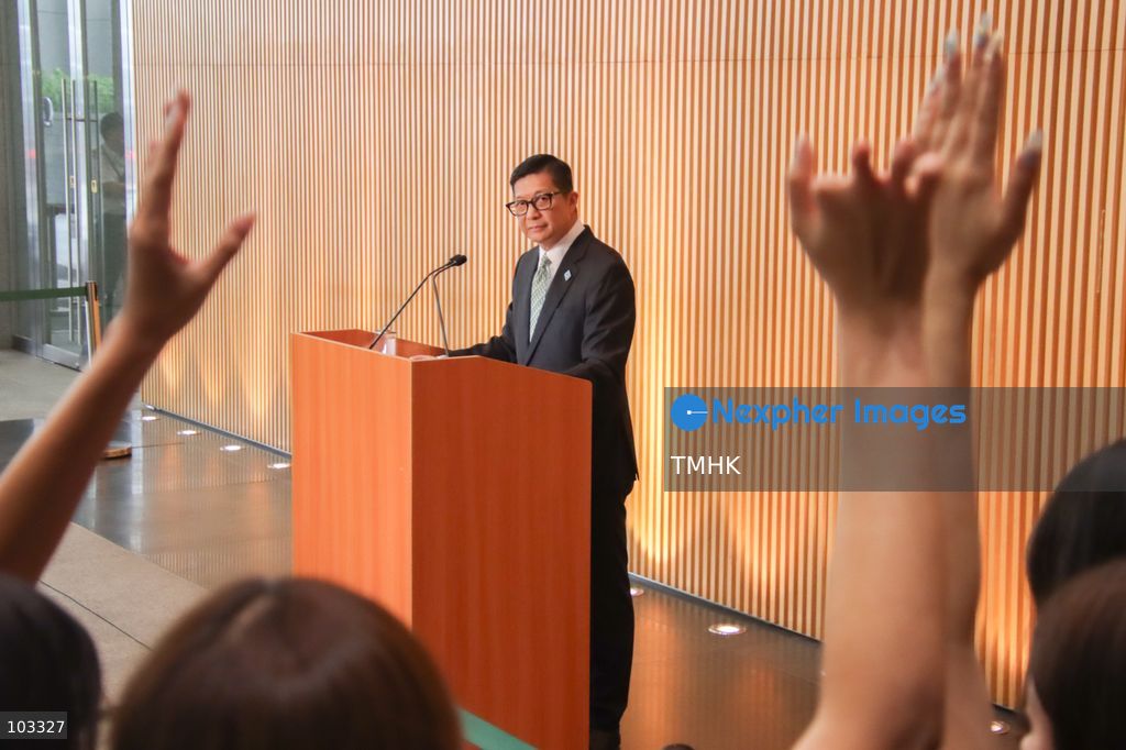 Journalists raise their hands to ask questions during a media briefing by Hong Kong Secretary for Security Chris Tang Ping-keung at the Central Government Offices in Hong Kong on October 9, 2026. The briefing focuses on arrangements for the opening of the redeveloped Huanggang Port on October 12. (Photo by Gordon Choi/TMHK via Nexpher Images)