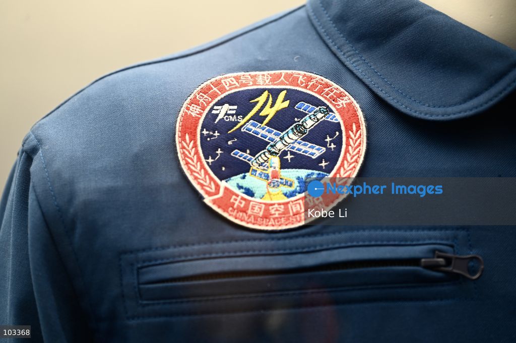 A general view showing an exhibit with Shenzhou-14 Manned Flight Mission Patch at "Fly Me to the Moon – A 380,000 km Odyssey" exhibition at K11 MUSEA on October 9, 2026 in Hong Kong. (Photo by Kobe Li/Nexpher Images)