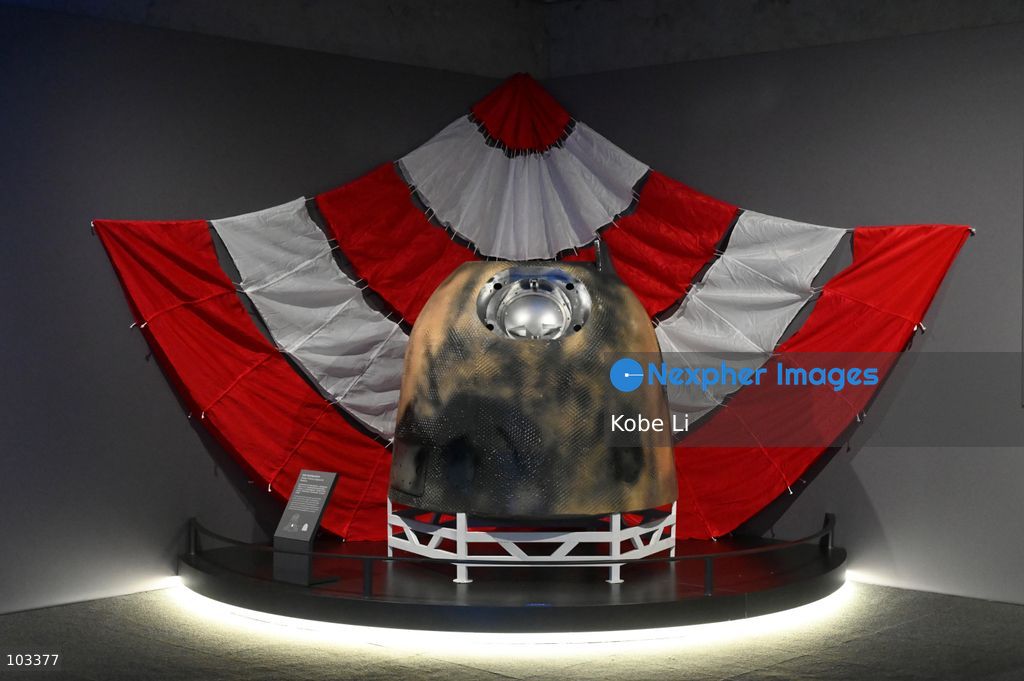 A general view showing Chang'e-6 Reentry Capsule and Parachute displaying at "Fly Me to the Moon – A 380,000 km Odyssey" exhibition a K11 MUSEA on October 9, 2026 in Hong Kong. (Photo by Kobe Li/Nexpher Images)