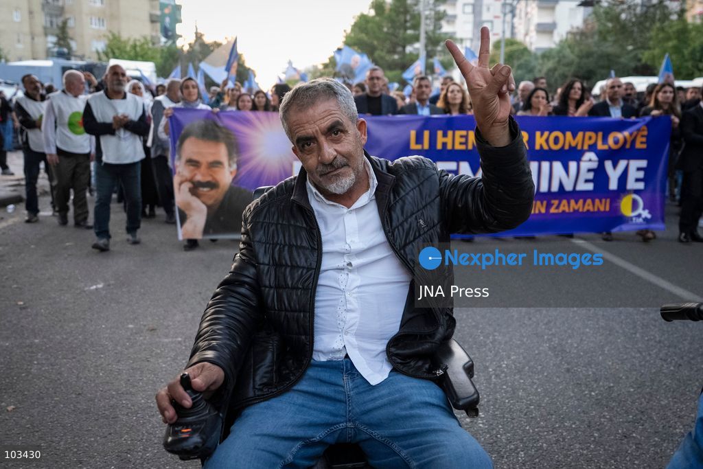DIYARBAKIR, TURKEY, OCTOBER 9, 2026: Supporters of the Peoples’ Equality and Democracy Party (DEM Party) and the Platform of Democratic Institutions march through Diyarbakir under the slogan “Status, Peace, Freedom,” marking the 28th anniversary of PKK leader Abdullah Ocalan’s expulsion from Syria on October 9, 1998. Addressing participants after the march, DEM Party lawmaker Serhat Eren described Ocalan’s expulsion as an “international conspiracy.” Photo by Ardil Batmaz / JNA Press (Photo by Ardıl Batmaz/JNA Press via Nexpher Images)