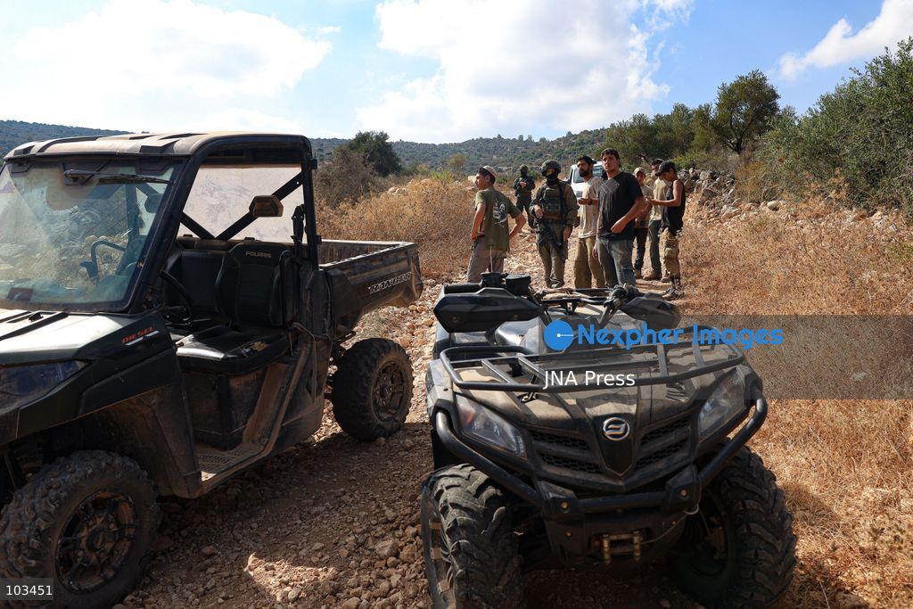 DEIR IBZI, OCCUPIED WEST BANK, OCTOBER 9, 2026: Israeli settlers confront Palestinian farmers, international activists and journalists during the annual olive harvest in the village of Deir Ibzi, west of Ramallah. According to the photographer, settlers attacked and harassed those accompanying the farmers, used pepper spray and prevented residents from completing the harvest on their agricultural land. The incident occurred during the olive harvest season, an important source of income for Palestinian farming communities in the occupied West Bank. Photo by Salman Mohsen Alkhatib / JNA Press (Photo by Salman Mohsen Alkhatib/JNA Press via Nexpher Images)