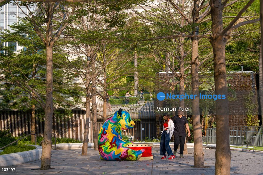People walk pass a bear statue on October 10, 2026 in Hong Kong. (Photo by Vernon Yuen/Nexpher Images)