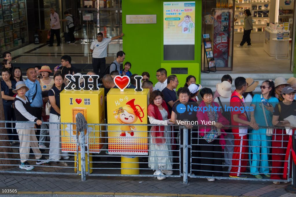 Tourist waiting to board a tour bus on October 10, 2026 in Hong Kong. (Photo by Vernon Yuen/Nexpher Images)