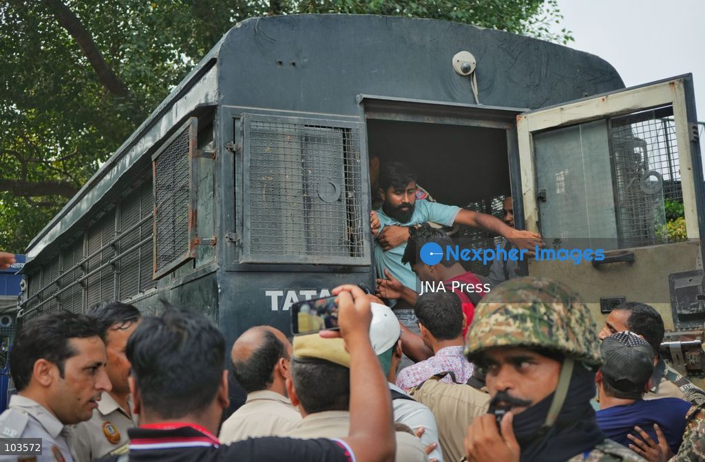 NEW DELHI, INDIA, OCTOBER 10, 2026: Police detain protesters near Jantar Mantar in New Delhi during demonstrations organized by the Cockroach Janta Party (CJP) demanding the resignation of Chief Election Commissioner Gyanesh Kumar. Protesters accused the Election Commission of irregularities in the Special Intensive Revision (SIR) of electoral rolls. Authorities deployed large numbers of police and security personnel and imposed restrictions on gatherings after denying permission for the planned demonstration. The Election Commission has denied allegations of wrongdoing in the voter-roll revision process. Photo by Sameer Hussain / JNA Press. (Photo by Sameer Hussain/JNA Press via Nexpher Images)