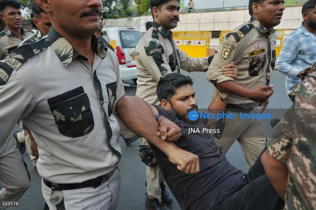 NEW DELHI, INDIA, OCTOBER 10, 2026: Police detain protesters near Jantar Mantar in New Delhi during demonstrations organized by the Cockroach Janta Party (CJP) demanding the resignation of Chief Election Commissioner Gyanesh Kumar. Protesters accused the Election Commission of irregularities in the Special Intensive Revision (SIR) of electoral rolls. Authorities deployed large numbers of police and security personnel and imposed restrictions on gatherings after denying permission for the planned demonstration. The Election Commission has denied allegations of wrongdoing in the voter-roll revision process. Photo by Sameer Hussain / JNA Press. (Photo by Sameer Hussain/JNA Press via Nexpher Images)