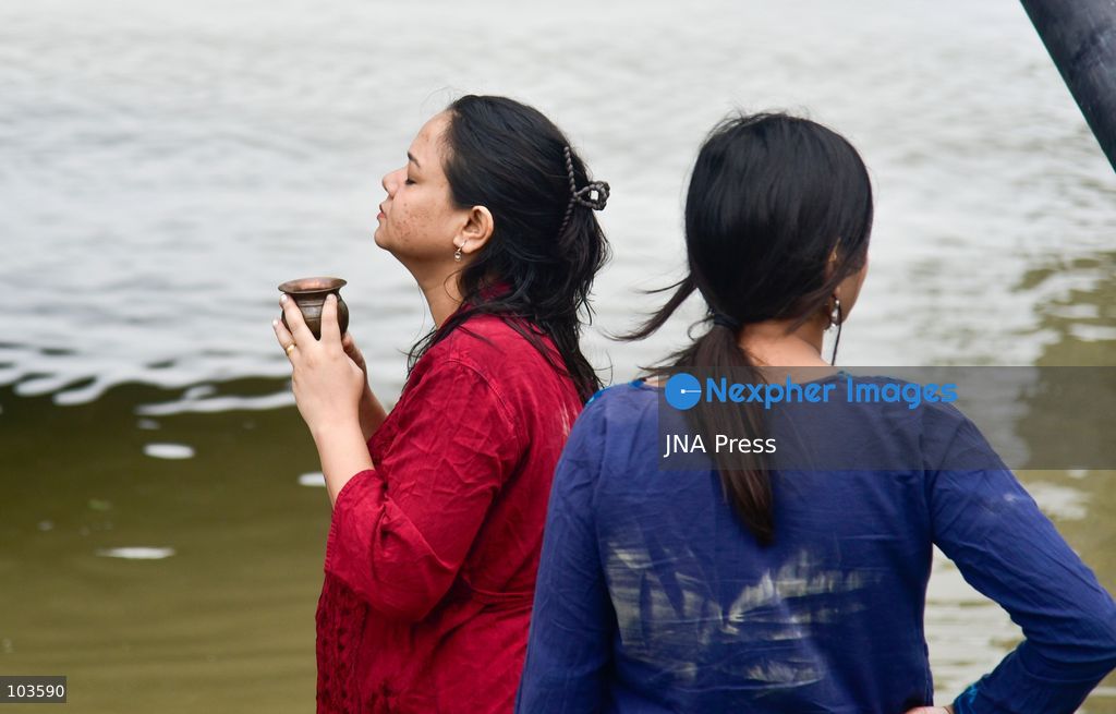 GUWAHATI, ASSAM, INDIA – OCTOBER 10, 2026: Hindu devotees perform the Tarpan ritual on the banks of the Brahmaputra River in Guwahati on the final day of Pitru Paksha, a period dedicated to honoring deceased ancestors in Hindu tradition. During Tarpan, devotees offer water and prayers as an act of remembrance and respect for their forefathers. Pitru Paksha is observed according to the Hindu lunar calendar and is traditionally marked by rituals intended to honor departed family members and seek blessings for their souls. The Brahmaputra riverbank is among the locations where devotees gather to perform these ancestral rites. The ritual reflects the continuing importance of family remembrance and religious observance in Hindu communities across India. Photo by Hafiz Ahmed / JNA Press. (Photo by Hafiz Ahmed/JNA Press via Nexpher Images)