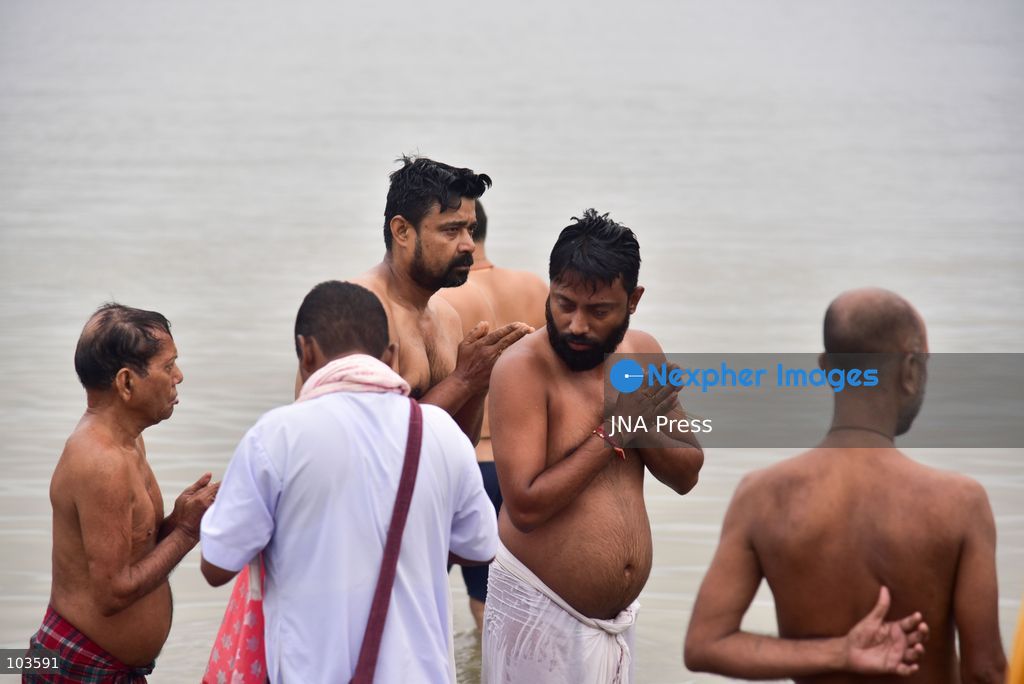GUWAHATI, ASSAM, INDIA – OCTOBER 10, 2026: Hindu devotees perform the Tarpan ritual on the banks of the Brahmaputra River in Guwahati on the final day of Pitru Paksha, a period dedicated to honoring deceased ancestors in Hindu tradition. During Tarpan, devotees offer water and prayers as an act of remembrance and respect for their forefathers. Pitru Paksha is observed according to the Hindu lunar calendar and is traditionally marked by rituals intended to honor departed family members and seek blessings for their souls. The Brahmaputra riverbank is among the locations where devotees gather to perform these ancestral rites. The ritual reflects the continuing importance of family remembrance and religious observance in Hindu communities across India. Photo by Hafiz Ahmed / JNA Press. (Photo by Hafiz Ahmed/JNA Press via Nexpher Images)