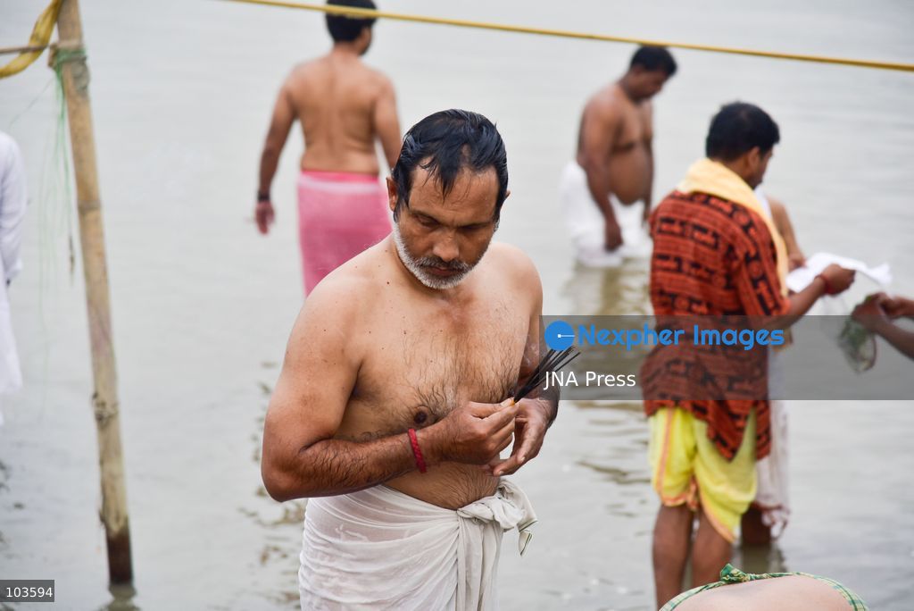 GUWAHATI, ASSAM, INDIA – OCTOBER 10, 2026: Hindu devotees perform the Tarpan ritual on the banks of the Brahmaputra River in Guwahati on the final day of Pitru Paksha, a period dedicated to honoring deceased ancestors in Hindu tradition. During Tarpan, devotees offer water and prayers as an act of remembrance and respect for their forefathers. Pitru Paksha is observed according to the Hindu lunar calendar and is traditionally marked by rituals intended to honor departed family members and seek blessings for their souls. The Brahmaputra riverbank is among the locations where devotees gather to perform these ancestral rites. The ritual reflects the continuing importance of family remembrance and religious observance in Hindu communities across India. Photo by Hafiz Ahmed / JNA Press. (Photo by Hafiz Ahmed/JNA Press via Nexpher Images)