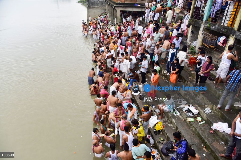 GUWAHATI, ASSAM, INDIA – OCTOBER 10, 2026: Hindu devotees perform the Tarpan ritual on the banks of the Brahmaputra River in Guwahati on the final day of Pitru Paksha, a period dedicated to honoring deceased ancestors in Hindu tradition. During Tarpan, devotees offer water and prayers as an act of remembrance and respect for their forefathers. Pitru Paksha is observed according to the Hindu lunar calendar and is traditionally marked by rituals intended to honor departed family members and seek blessings for their souls. The Brahmaputra riverbank is among the locations where devotees gather to perform these ancestral rites. The ritual reflects the continuing importance of family remembrance and religious observance in Hindu communities across India. Photo by Hafiz Ahmed / JNA Press. (Photo by Hafiz Ahmed/JNA Press via Nexpher Images)
