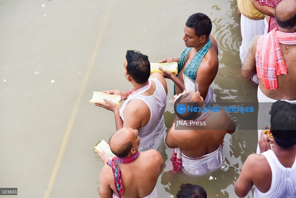 GUWAHATI, ASSAM, INDIA – OCTOBER 10, 2026: Hindu devotees perform the Tarpan ritual on the banks of the Brahmaputra River in Guwahati on the final day of Pitru Paksha, a period dedicated to honoring deceased ancestors in Hindu tradition. During Tarpan, devotees offer water and prayers as an act of remembrance and respect for their forefathers. Pitru Paksha is observed according to the Hindu lunar calendar and is traditionally marked by rituals intended to honor departed family members and seek blessings for their souls. The Brahmaputra riverbank is among the locations where devotees gather to perform these ancestral rites. The ritual reflects the continuing importance of family remembrance and religious observance in Hindu communities across India. Photo by Hafiz Ahmed / JNA Press. (Photo by Hafiz Ahmed/JNA Press via Nexpher Images)