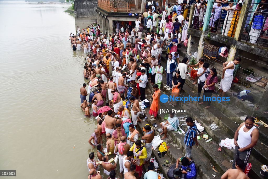 GUWAHATI, ASSAM, INDIA – OCTOBER 10, 2026: Hindu devotees perform the Tarpan ritual on the banks of the Brahmaputra River in Guwahati on the final day of Pitru Paksha, a period dedicated to honoring deceased ancestors in Hindu tradition. During Tarpan, devotees offer water and prayers as an act of remembrance and respect for their forefathers. Pitru Paksha is observed according to the Hindu lunar calendar and is traditionally marked by rituals intended to honor departed family members and seek blessings for their souls. The Brahmaputra riverbank is among the locations where devotees gather to perform these ancestral rites. The ritual reflects the continuing importance of family remembrance and religious observance in Hindu communities across India. Photo by Hafiz Ahmed / JNA Press. (Photo by Hafiz Ahmed/JNA Press via Nexpher Images)