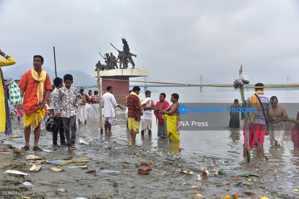 GUWAHATI, ASSAM, INDIA – OCTOBER 10, 2026: Hindu devotees perform the Tarpan ritual on the banks of the Brahmaputra River in Guwahati on the final day of Pitru Paksha, a period dedicated to honoring deceased ancestors in Hindu tradition. During Tarpan, devotees offer water and prayers as an act of remembrance and respect for their forefathers. Pitru Paksha is observed according to the Hindu lunar calendar and is traditionally marked by rituals intended to honor departed family members and seek blessings for their souls. The Brahmaputra riverbank is among the locations where devotees gather to perform these ancestral rites. The ritual reflects the continuing importance of family remembrance and religious observance in Hindu communities across India. Photo by Hafiz Ahmed / JNA Press. (Photo by Hafiz Ahmed/JNA Press via Nexpher Images)