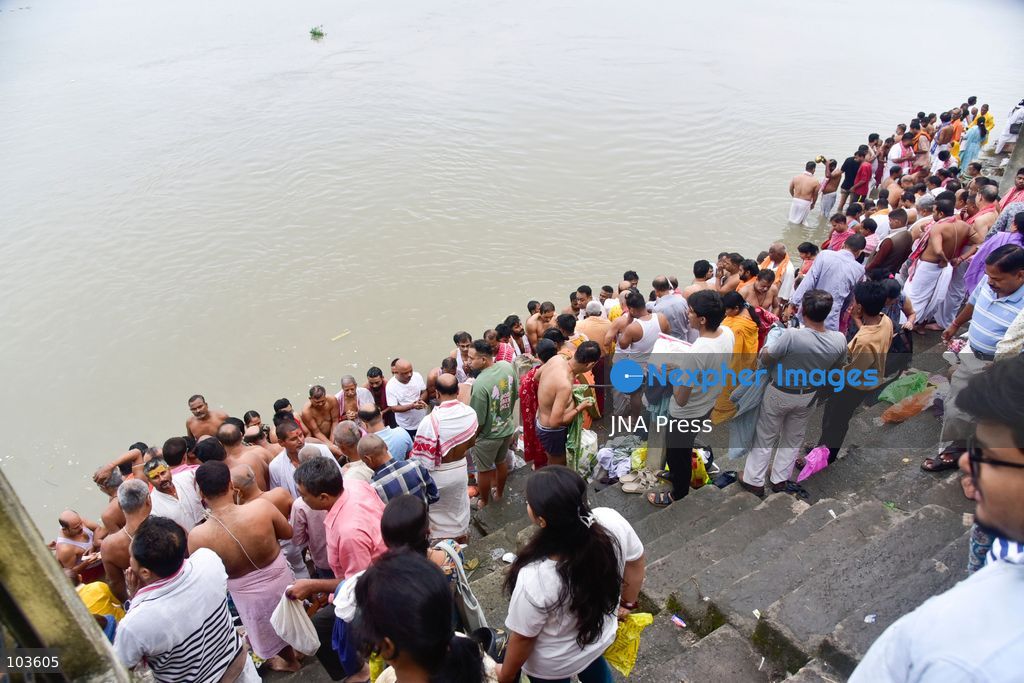 GUWAHATI, ASSAM, INDIA – OCTOBER 10, 2026: Hindu devotees perform the Tarpan ritual on the banks of the Brahmaputra River in Guwahati on the final day of Pitru Paksha, a period dedicated to honoring deceased ancestors in Hindu tradition. During Tarpan, devotees offer water and prayers as an act of remembrance and respect for their forefathers. Pitru Paksha is observed according to the Hindu lunar calendar and is traditionally marked by rituals intended to honor departed family members and seek blessings for their souls. The Brahmaputra riverbank is among the locations where devotees gather to perform these ancestral rites. The ritual reflects the continuing importance of family remembrance and religious observance in Hindu communities across India. Photo by Hafiz Ahmed / JNA Press. (Photo by Hafiz Ahmed/JNA Press via Nexpher Images)