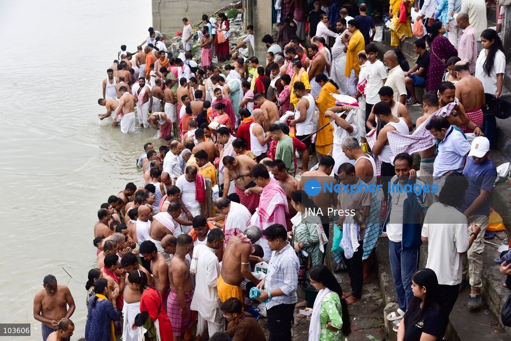 GUWAHATI, ASSAM, INDIA – OCTOBER 10, 2026: Hindu devotees perform the Tarpan ritual on the banks of the Brahmaputra River in Guwahati on the final day of Pitru Paksha, a period dedicated to honoring deceased ancestors in Hindu tradition. During Tarpan, devotees offer water and prayers as an act of remembrance and respect for their forefathers. Pitru Paksha is observed according to the Hindu lunar calendar and is traditionally marked by rituals intended to honor departed family members and seek blessings for their souls. The Brahmaputra riverbank is among the locations where devotees gather to perform these ancestral rites. The ritual reflects the continuing importance of family remembrance and religious observance in Hindu communities across India. Photo by Hafiz Ahmed / JNA Press. (Photo by Hafiz Ahmed/JNA Press via Nexpher Images)