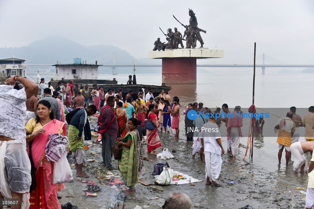 GUWAHATI, ASSAM, INDIA – OCTOBER 10, 2026: Hindu devotees perform the Tarpan ritual on the banks of the Brahmaputra River in Guwahati on the final day of Pitru Paksha, a period dedicated to honoring deceased ancestors in Hindu tradition. During Tarpan, devotees offer water and prayers as an act of remembrance and respect for their forefathers. Pitru Paksha is observed according to the Hindu lunar calendar and is traditionally marked by rituals intended to honor departed family members and seek blessings for their souls. The Brahmaputra riverbank is among the locations where devotees gather to perform these ancestral rites. The ritual reflects the continuing importance of family remembrance and religious observance in Hindu communities across India. Photo by Hafiz Ahmed / JNA Press. (Photo by Hafiz Ahmed/JNA Press via Nexpher Images)