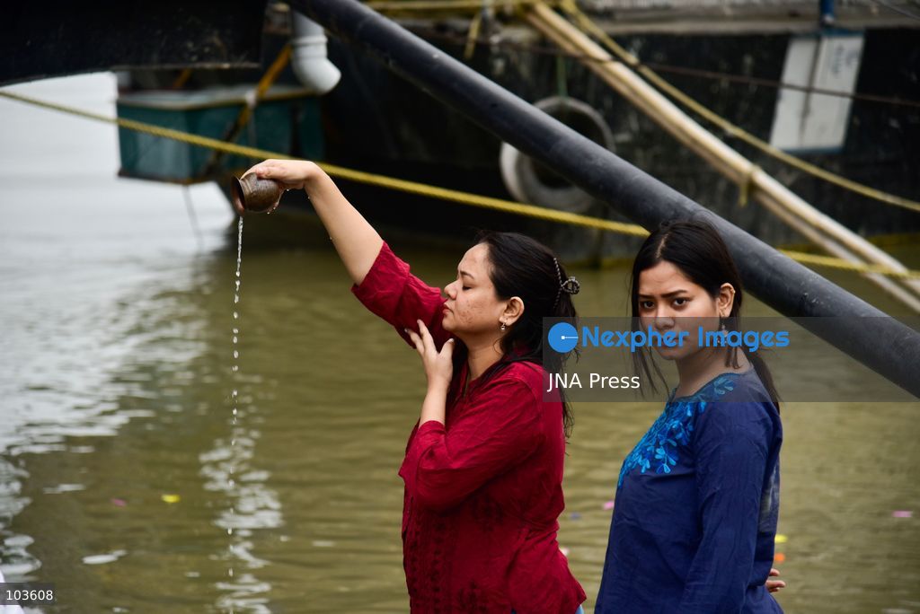 GUWAHATI, ASSAM, INDIA – OCTOBER 10, 2026: Hindu devotees perform the Tarpan ritual on the banks of the Brahmaputra River in Guwahati on the final day of Pitru Paksha, a period dedicated to honoring deceased ancestors in Hindu tradition. During Tarpan, devotees offer water and prayers as an act of remembrance and respect for their forefathers. Pitru Paksha is observed according to the Hindu lunar calendar and is traditionally marked by rituals intended to honor departed family members and seek blessings for their souls. The Brahmaputra riverbank is among the locations where devotees gather to perform these ancestral rites. The ritual reflects the continuing importance of family remembrance and religious observance in Hindu communities across India. Photo by Hafiz Ahmed / JNA Press. (Photo by Hafiz Ahmed/JNA Press via Nexpher Images)