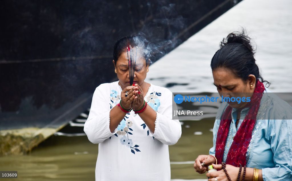 GUWAHATI, ASSAM, INDIA – OCTOBER 10, 2026: Hindu devotees perform the Tarpan ritual on the banks of the Brahmaputra River in Guwahati on the final day of Pitru Paksha, a period dedicated to honoring deceased ancestors in Hindu tradition. During Tarpan, devotees offer water and prayers as an act of remembrance and respect for their forefathers. Pitru Paksha is observed according to the Hindu lunar calendar and is traditionally marked by rituals intended to honor departed family members and seek blessings for their souls. The Brahmaputra riverbank is among the locations where devotees gather to perform these ancestral rites. The ritual reflects the continuing importance of family remembrance and religious observance in Hindu communities across India. Photo by Hafiz Ahmed / JNA Press. (Photo by Hafiz Ahmed/JNA Press via Nexpher Images)