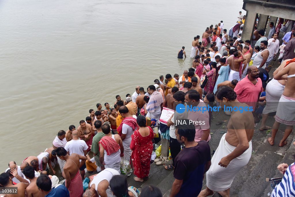GUWAHATI, ASSAM, INDIA – OCTOBER 10, 2026: Hindu devotees perform the Tarpan ritual on the banks of the Brahmaputra River in Guwahati on the final day of Pitru Paksha, a period dedicated to honoring deceased ancestors in Hindu tradition. During Tarpan, devotees offer water and prayers as an act of remembrance and respect for their forefathers. Pitru Paksha is observed according to the Hindu lunar calendar and is traditionally marked by rituals intended to honor departed family members and seek blessings for their souls. The Brahmaputra riverbank is among the locations where devotees gather to perform these ancestral rites. The ritual reflects the continuing importance of family remembrance and religious observance in Hindu communities across India. Photo by Hafiz Ahmed / JNA Press. (Photo by Hafiz Ahmed/JNA Press via Nexpher Images)