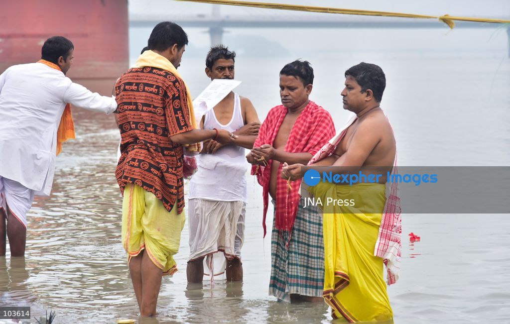 GUWAHATI, ASSAM, INDIA – OCTOBER 10, 2026: Hindu devotees perform the Tarpan ritual on the banks of the Brahmaputra River in Guwahati on the final day of Pitru Paksha, a period dedicated to honoring deceased ancestors in Hindu tradition. During Tarpan, devotees offer water and prayers as an act of remembrance and respect for their forefathers. Pitru Paksha is observed according to the Hindu lunar calendar and is traditionally marked by rituals intended to honor departed family members and seek blessings for their souls. The Brahmaputra riverbank is among the locations where devotees gather to perform these ancestral rites. The ritual reflects the continuing importance of family remembrance and religious observance in Hindu communities across India. Photo by Hafiz Ahmed / JNA Press. (Photo by Hafiz Ahmed/JNA Press via Nexpher Images)