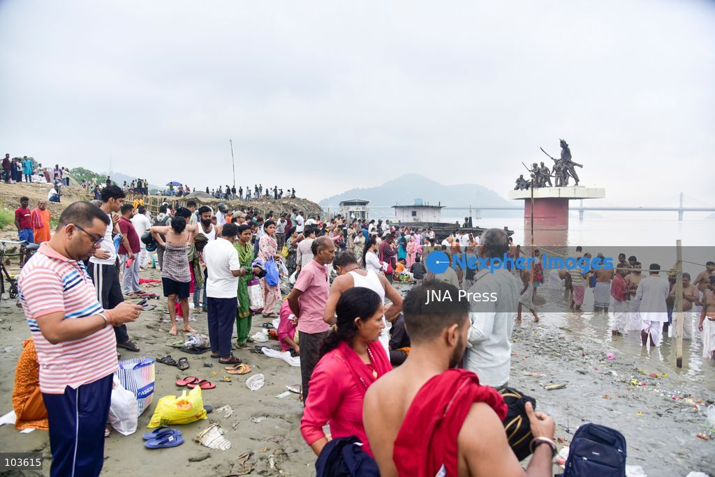 GUWAHATI, ASSAM, INDIA – OCTOBER 10, 2026: Hindu devotees perform the Tarpan ritual on the banks of the Brahmaputra River in Guwahati on the final day of Pitru Paksha, a period dedicated to honoring deceased ancestors in Hindu tradition. During Tarpan, devotees offer water and prayers as an act of remembrance and respect for their forefathers. Pitru Paksha is observed according to the Hindu lunar calendar and is traditionally marked by rituals intended to honor departed family members and seek blessings for their souls. The Brahmaputra riverbank is among the locations where devotees gather to perform these ancestral rites. The ritual reflects the continuing importance of family remembrance and religious observance in Hindu communities across India. Photo by Hafiz Ahmed / JNA Press. (Photo by Hafiz Ahmed/JNA Press via Nexpher Images)