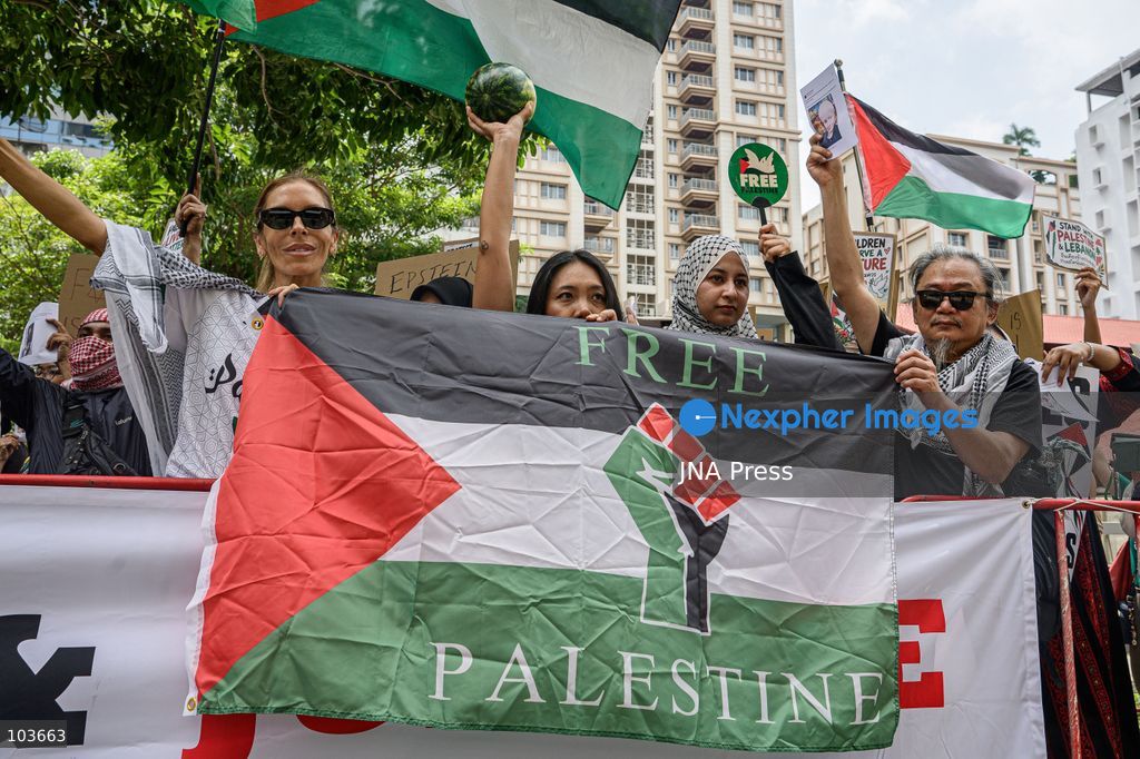 BANGKOK, THAILAND, OCTOBER 10, 2026: Pro-Palestinian demonstrators gather outside the Israeli Embassy in Bangkok during a protest marking 1,100 days since the start of the war in Gaza. Participants held portraits of Palestinians killed during the conflict for three minutes in an action titled "Every Life Isn't Just a Number," symbolizing three years of war. The demonstration was held as part of a Global Action Day for Palestine. Photo by Watsawat Koktabtim / JNA Press. (Photo by Watsawat Koktabtim/JNA Press via Nexpher Images)