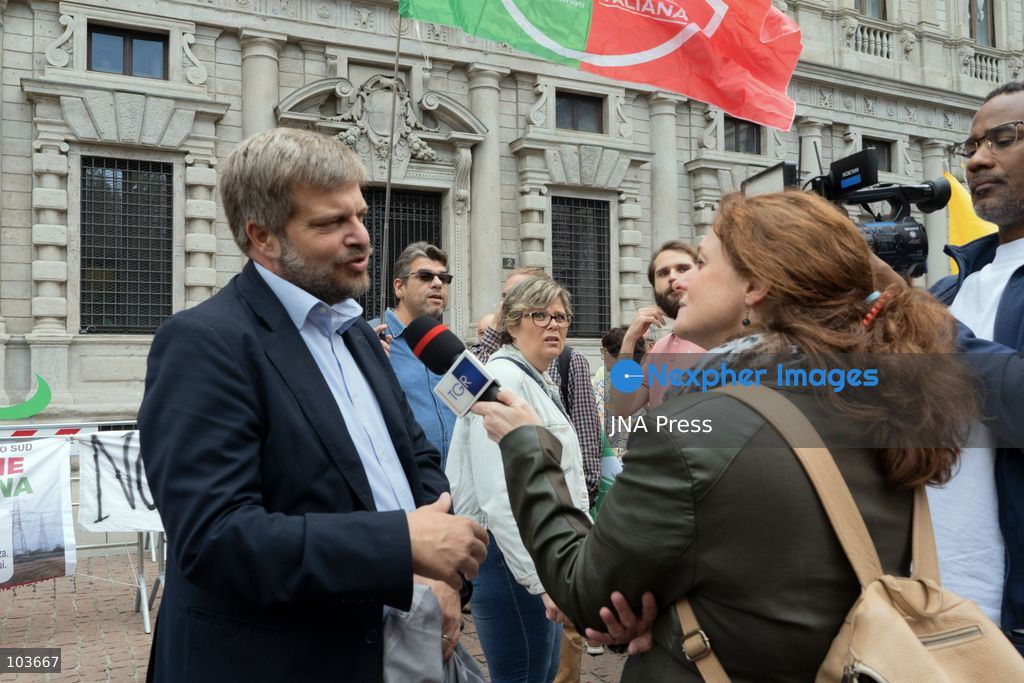 MILAN, ITALY – OCTOBER 10, 2026: Protesters gather for a sit-in in Piazza della Scala in central Milan to oppose the development of new data centers across Lombardy and Italy. The demonstration is organized by the Rete dei Comitati No Data Center (No Data Center Committee Network), which is calling for a moratorium on permits for new facilities. The group also urges public authorities to conduct thorough environmental, urban planning and regional assessments before approving projects. For approved facilities that have not yet begun operating, campaigners are calling for reviews to be reopened if potential microclimate effects and cumulative impacts with existing facilities were not adequately assessed. Lombardy is a major center for Italy’s data center industry. In 2024, the region hosted 67 of Italy’s 168 operational facilities and accounted for approximately 63% of applications for new developments, according to the supplied information. Photo by Calogero Russo / JNA Press. (Photo by calogero russo/JNA Press via Nexpher Images)