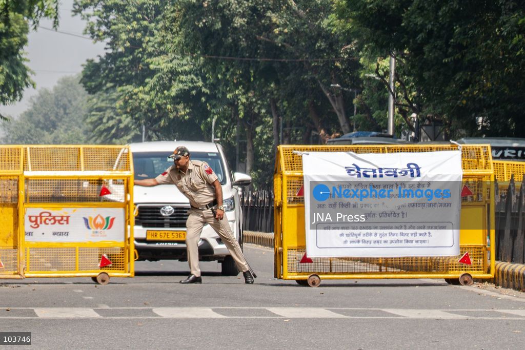NEW DELHI, INDIA, OCTOBER 10, 2026: Security personnel stand guard near barricades along Ashoka Road in New Delhi amid heightened security measures ahead of a protest called by the youth-led Cockroach Janta Party (CJP). The movement demanded the resignation of Chief Election Commissioner Gyanesh Kumar over alleged irregularities in electoral roll revisions. Police deployed additional forces and restricted access to several areas of central Delhi after denying permission for the planned demonstration at Jantar Mantar. Photo by Yanni Rawat / JNA Press. (Photo by yanni rawat/JNA Press via Nexpher Images)