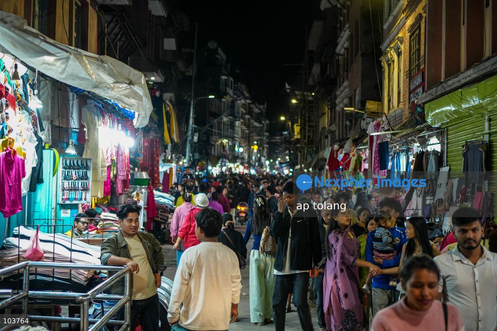 Lalitpur, NEPAL, October 10, 2026: People shop for clothes, footwear, and accessories at a busy market in Lalitpur, Nepal, ahead of the Dashain festival. Shoppers visit markets to purchase new clothes and other essentials for family gatherings and traditional celebrations. (Photo by ap tolang/Nexpher Images)