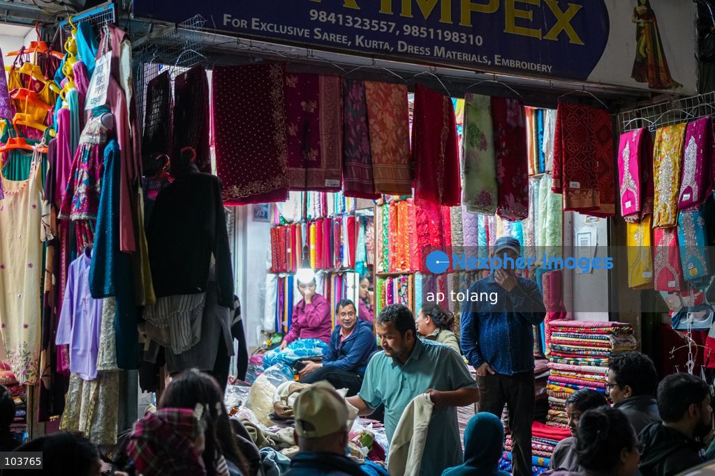 Lalitpur, NEPAL, October 10, 2026: People shop for clothes, footwear, and accessories at a busy market in Lalitpur, Nepal, ahead of the Dashain festival. Shoppers visit markets to purchase new clothes and other essentials for family gatherings and traditional celebrations. (Photo by ap tolang/Nexpher Images)